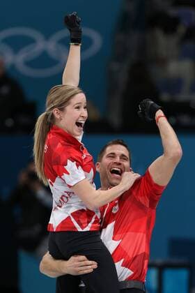 Themen der Woche - SPORT Bilder des Tages - SPORT Kaitlyn Lawes (L) and John Morris of Canada celebrate after winning the Gold Medal Mixed Doubles game against Switzerland at the Gangneung Curling Center in Gangneung, South Korea during the 2018 Pyeongchang Winter Olympics on February 13, 2018. Canada won 10-3.  OLY20180213812 ANDREWxWONG