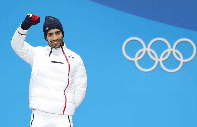 (180213) -- PYEONGCHANG, Feb. 13, 2018 -- Champion Martin Fourcade from France poses for photos during medal ceremony of men s 12.5km pursuit event of biathlon at 2018 PyeongChang Winter Olympic Games Olympische Spiele Olympia OS at the Medal Plaza in PyeongChang, Feb. 13, 2018. ) (SP)OLY-SOUTH KOREA-PYEONGCHANG-BIATHLON-MEN S 12.5KM PERSUIT-MEDAL CEREMONY BaixXuefei 
