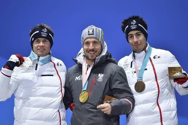 von links: Alexis PINTURAULT, FRA, 2. Platz, Silber, Silbermedaille, Silbermedaillengewinner, MARCEL HIRSCHER (AUT), 1. Platz, Goldmedaillengewinner, Gold, Goldmedaille, Olympiasieger, Victor MUFFAT-JEANDET, FRA, 3. Platz, Bronze, Bronzemedaille, Bronzemedaillengewinner, Jubel, jubelt, Freude, Begeisterung, Emotion, jubeln, cheers, Men s Alpine Combined, Ski Alpin, Kombination, Siegerehrung,Victory Ceremony, PyeongChang Olympic Medals Plaza am 13.02.2018. Olympische Winterspiele 2018, vom 09.02. - 25.02.2018 in PyeongChang Suedkorea. Â
