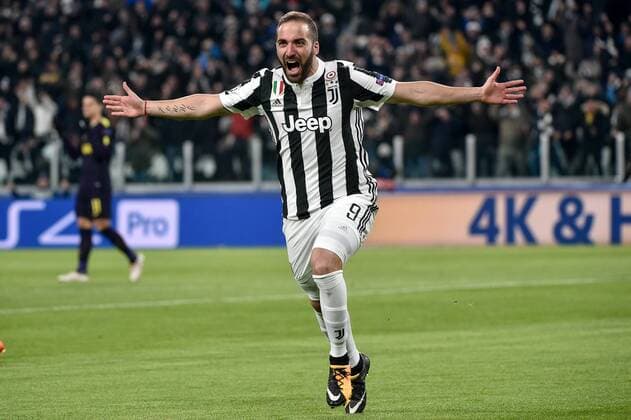 February 13, 2018 - Turin, Italy - Gonzalo Higuain of Juventus celebrates scoring first goal during the UEFA Champions League Round of 16 match between Juventus and Tottenham Hotspur at the Juventus Stadium, Turin, Italy on 13 February 2018. Juventus v Tottenham - UEFA Champions League  - ZUMAn230 20180213_zaa_n230_549 Copyright: xGiuseppexMaffiax