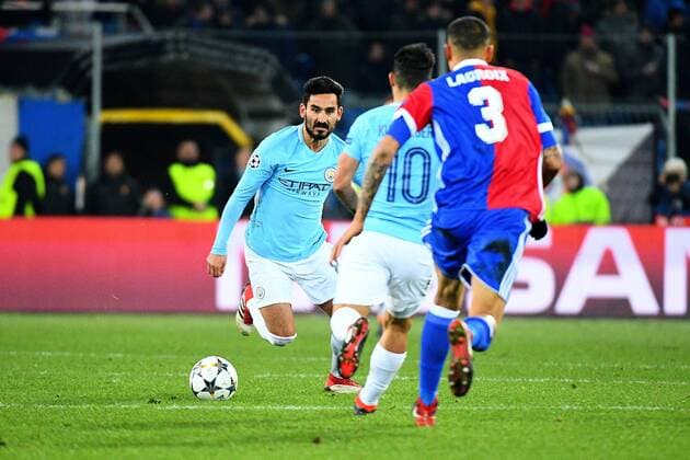 13th February 2018, St Jakob Park, Basel, Switzerland; UEFA Champions League football, round of 16, first leg, FC Basel versus Manchester City; Ilkay Gundogan of Manchester City gets to the ball before Sergio Aguero of Manchester City and Leo Lacroix of FC Basel  ActionPlus11986760