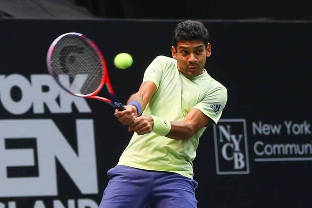 UNIONDALE, NY - FEBRUARY 13: Divij Sharan of India returns during his doubles match in the New York Open on February 13, 2018, at NYCB Live in Uniondale, NY. (Photo by Rich Graessle Icon Sportswire) TENNIS: FEB 13 New York Open Icon0213181559 EDITORIAL USE ONLY