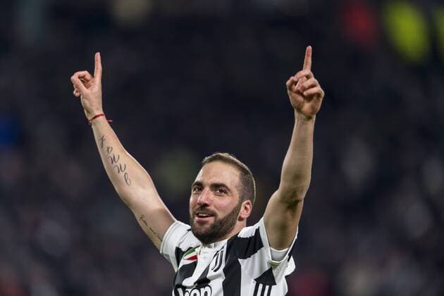 Gonzalo Gerardo Higuain of Juventus celebrates after scoring his team s second goal during the Italian Uefa Champions League Round of 16 First leg match between Juventus 2-2 Tottenham Hotspur at Allianz Stadium on February 13, 2018 in Torino, Germany. Noxthirdxpartyxsales  (72086786)