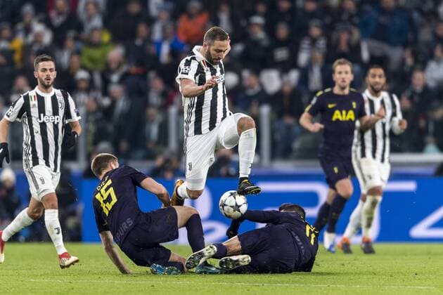 Gonzalo Gerardo Higuain of Juventus and Erik Manuel Lamela of Tottenham Hotspur F.C. and Eric Jeremy Edgar Dier of Tottenham Hotspur F.C. during the Italian Uefa Champions League Round of 16 First leg match between Juventus 2-2 Tottenham Hotspur at Allianz Stadium on February 13, 2018 in Torino, Germany. Noxthirdxpartyxsales  (72086940)