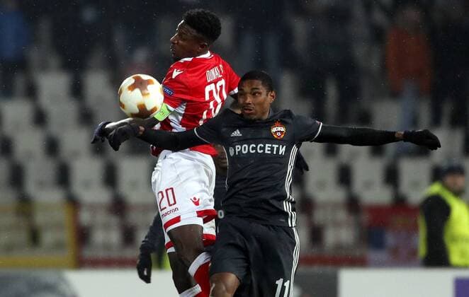 (180214) -- BELGRADE, Feb. 14, 2018 -- Crvena Zvezda s Mitchell Donald (L) vies with CSKA Moscow s Vitinho during the UEFA Europa League round of 32 first leg football match between Crvena Zvezda and CSKA Moscow in Belgrade, Serbia on Feb. 13, 2018. The match ended with 0-0.) (SP)SERBIA-BELGRADE- EUROPA-FOOTBALL-CRVENA ZVEZDA VS CSKA PredragxMilosavljevic 