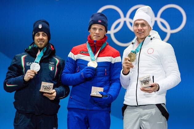 180214 Federico Pellegrino of Italy, silver, Johannes Hosflot Klaebo of Norway, Gold, and Alexander Bolshunov of OAR (Russia), celebrates at the medal ceremony for the Men s Cross Country Sprint during day five of the 2018 Winter Olympics on February 14, 2018 in Pyeongchang. Photo: Carl Sandin BILDBYRAN kod CS 57999_292 Copyright: CARLxSANDIN BB180214CS101