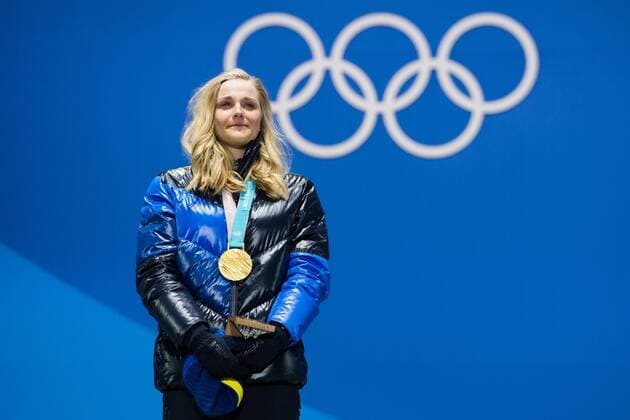 180214 Stina Nilsson of Sweden, Gold, celebrates at the medal ceremony for the Men s Cross Country Sprint during day five of the 2018 Winter Olympics on February 14, 2018 in Pyeongchang. Photo: Carl Sandin BILDBYRAN kod CS 57999_292 Copyright: CARLxSANDIN BB180214CS103