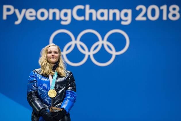 180214 Stina Nilsson of Sweden, Gold, celebrates at the medal ceremony for the Men s Cross Country Sprint during day five of the 2018 Winter Olympics on February 14, 2018 in Pyeongchang. Photo: Carl Sandin BILDBYRAN kod CS 57999_292 Copyright: CARLxSANDIN BB180214CS105