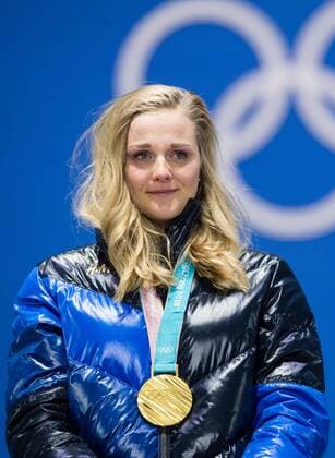 Olympia-Bilder des Tages - SPORT 180214 Stina Nilsson of Sweden, Gold, in tears while celebrating at the medal ceremony for the Men s Cross Country Sprint during day five of the 2018 Winter Olympics on February 14, 2018 in Pyeongchang. Photo: Carl Sandin BILDBYRN kod CS 57999_292 Copyright: CARLxSANDIN BB180214CS107