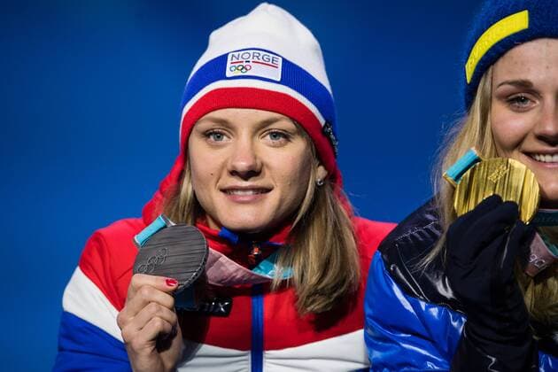 180214 Maiken Caspersen Falla of Norway, Silver, and Stina Nilsson of Sweden, Gold, celebrating at the medal ceremony for the Women s Cross Country Sprint during day five of the 2018 Winter Olympics on February 14, 2018 in Pyeongchang. Photo: Carl Sandin BILDBYRN kod CS 57999_292 Copyright: CARLxSANDIN BB180214CS112