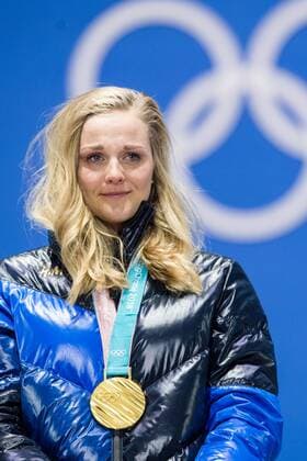 180214 Stina Nilsson of Sweden, Gold, celebrating at the medal ceremony for the Women s Cross Country Sprint during day five of the 2018 Winter Olympics on February 14, 2018 in Pyeongchang. Photo: Carl Sandin BILDBYRN kod CS 57999_292 Copyright: CARLxSANDIN BB180214CS113