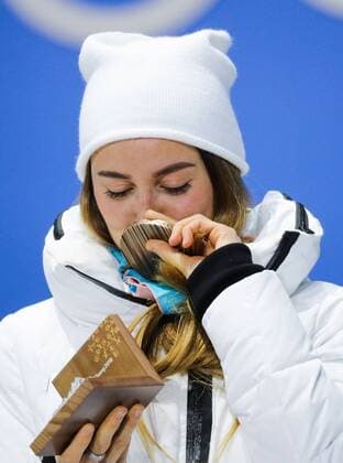 PYEONGCHANG, SOUTH KOREA - FEBRUARY 14, 2018: Bronze medalist, Olympic Athlete from Russia Yulia Belorukova at a medal ceremony for the ladies cross-country skiing individual sprint classic event at the 2018 Winter Olympic Games Olympische Spiele Olympia OS at Medals Plaza. Sergei Bobylev TASS  TS073C30