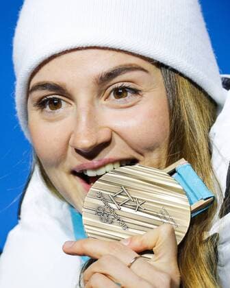 PYEONGCHANG, SOUTH KOREA - FEBRUARY 14, 2018: Bronze medalist, Olympic Athlete from Russia Yulia Belorukova at a medal ceremony for the ladies cross-country skiing individual sprint classic event at the 2018 Winter Olympic Games Olympische Spiele Olympia OS at Medals Plaza. Sergei Bobylev TASS  TS073C4E
