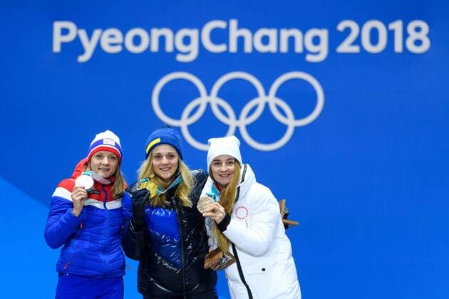 180214 Maiken Caspersen Falla of Norway, Silver, Stina Nilsson of Sweden, Gold, and Yulia Belorukova of Russia (OAR), bronze, at the medal ceremony for the Women s Cross Country Sprint during day five of the 2018 Winter Olympics on February 14, 2018 in Pyeongchang. Photo: Carl Sandin BILDBYRN kod CS 57999_292 Copyright: CARLxSANDIN BB180214CS136