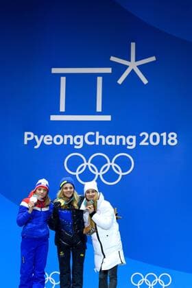180214 Maiken Caspersen Falla of Norway, Silver, Stina Nilsson of Sweden, Gold, and Yulia Belorukova of Russia (OAR), bronze, at the medal ceremony for the Women s Cross Country Sprint during day five of the 2018 Winter Olympics on February 14, 2018 in Pyeongchang. Photo: Carl Sandin BILDBYRAN kod CS 57999_292 Copyright: CARLxSANDIN BB180214CS139