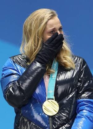 Olympia-Bilder des Tages - SPORT (180214) -- PYEONGCHANG, Feb. 14, 2018 -- Champion Stina Nilsson from Sweden reacts during medal ceremony of ladie s sprint classic event of cross-country skiing at 2018 PyeongChang Winter Olympic Games Olympische Spiele Olympia OS at the Medal Plaza in PyeongChang, South Korea, Feb. 14, 2018. ) (SP)OLY-SOUTH KOREA-PYEONGCHANG-CROSS-COUNTRY SKIING-LADIES SPRINT CLASSIC-MEDAL CEREMONY WuxZhuang 