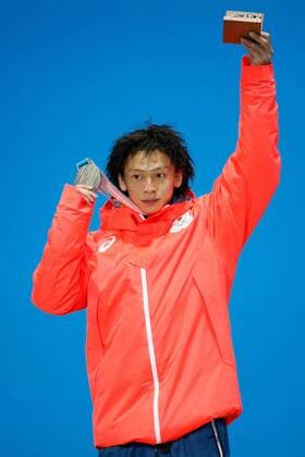 MenÕs Snowboard Halfpipe silver medalist Ayumu Hirano of Japan celebrates at the medals ceremony for the 2018 Pyeongchang Winter Olympics at the Pyeongchang Medals Plaza in Pyeongchang, South Korea, on February 14, 2018.  OLY20180214140 MATTHEWxHEALEY