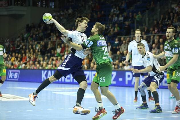 14.02.2018, xcsx, Handball EHF-Pokal, SC Magdeburg - Bjerringbro-Silkeborg, emspor, v.l. Sebastian Skubbe (Bjerringbro-Silkeborg), Marko Bezjak (SC Magdeburg), Zweikampf, battle for the ball Magdeburg