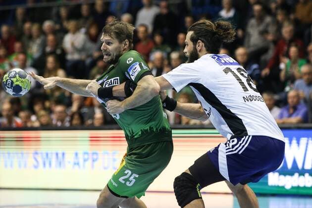 Marko Bezjak (SC Magdeburg) gegen Jesper Nöddesbo (Bjerringbro Silkeborg) - Handball EHF-Cup-Gruppenphase Saison 2017-2018 SC Magdeburg vs. Bjerringbro-Silkeborg in der GETEC Arena in Magdeburg - Aktion,Deutschland, Handball, Mann, Maenner,14.02.2018
