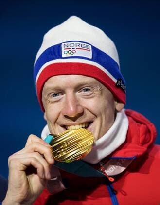 180216 Johannes Thingnes Bo of Norway gold celebrate at a Medal Ceremony for Men s Biathlon 20 km during day seven of the 2018 Winter Olympics on February 16, 2018 in Pyeongchang. Photo: Jon Olav Nesvold BILDBYRAN kod JE 160172 Copyright: JONxOLAVxNESVOLD BB180216JE063