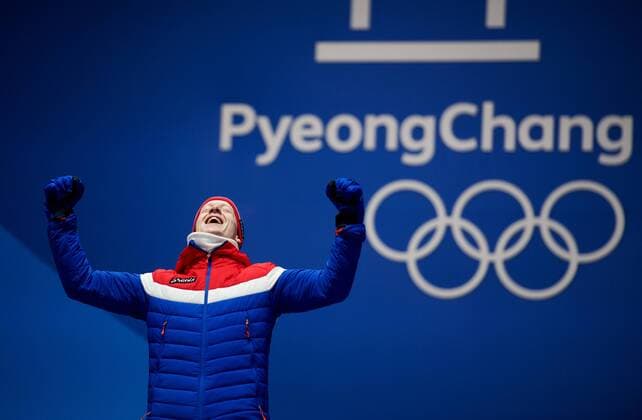 180216 Johannes Thingnes Bo of Norway gold celebrate at a Medal Ceremony for Men s Biathlon 20 km during day seven of the 2018 Winter Olympics on February 16, 2018 in Pyeongchang. Photo: Jon Olav Nesvold BILDBYRAN kod JE 160172 Copyright: JONxOLAVxNESVOLD BB180216JE066