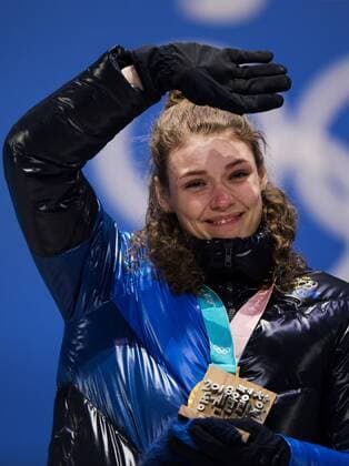 180216 Hanna Öberg of Sweden (gold) celebrate at a Medal Ceremony for women s 15 km biathlon during day seven of the 2018 Winter Olympics on February 16, 2018 in Pyeongchang. Photo: Jon Olav Nesvold BILDBYRAN kod JE 160172 Copyright: JONxOLAVxNESVOLD BB180216JE073
