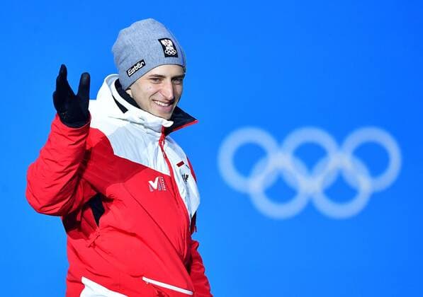 Gold medalist Austria s Matthias Mayer waves as he arrives for the medal ceremony for Men s Alpine Super-G at the Pyeongchang 2018 Winter Olympics in Pyeongchang, South Korea, on February 16, 2018.  OLY20180216350 KEVINxDIETSCH