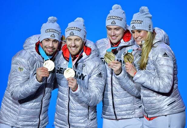 Gold medalist Germany s Natalie Geisenberger, Johannes Ludwig, Tobias Wendl and Tobias Arlt celebrate during the medal ceremony for Luge Team Relay at the Pyeongchang 2018 Winter Olympics in Pyeongchang, South Korea, on February 16, 2018.  OLY20180216358 KEVINxDIETSCH