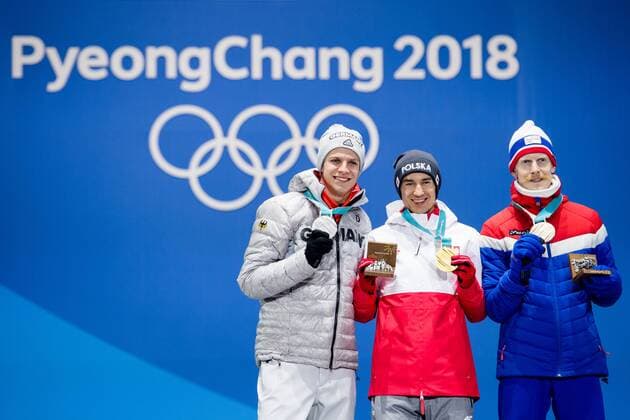 PyeongChang 2018 - Skispringen, Großschanze Herren Siegerehrung 180218 Kamil Stoch of Germany, Silver, Andreas Wellinger of Poland, Gold, and Robert Johansson of Norway, Bronze, at a Medal Ceremony for Ski jumping Skispringen Ski nordisch during day nine of the 2018 Winter Olympics on February 18, 2018 in Pyeongchang. Photo: Petter Arvidson BILDBYRAN kod PA 91980 Copyright: PETTERxARVIDSON BB180218PA127