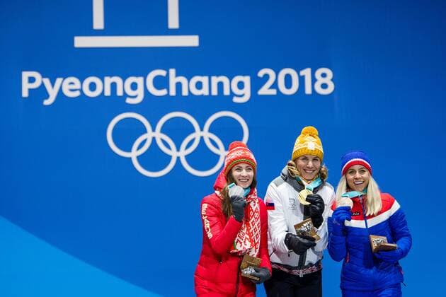 PyeongChang 2018 - Biathlon, 12,5km Massenstart Damen Siegerehrung 180218 Darya Domarcheva of Belarus, Silver, Anastasiya Kuzmina of Slovakia, Gold, Marte Olsbu of Norway , Bronze, celebrating at a Medal Ceremony for Women s 12.5km Mass Start during day nine of the 2018 Winter Olympics on February 18, 2018 in Pyeongchang. Photo: Petter Arvidson BILDBYRAN kod PA 91980 Copyright: PETTERxARVIDSON BB180218PA132