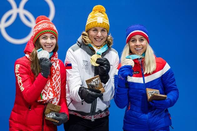 PyeongChang 2018 - Biathlon, 12,5km Massenstart Damen Siegerehrung 180218 Darya Domarcheva of Belarus, Silver, Anastasiya Kuzmina of Slovakia, Gold, Marte Olsbu of Norway , Bronze, celebrating at a Medal Ceremony for Women s 12.5km Mass Start during day nine of the 2018 Winter Olympics on February 18, 2018 in Pyeongchang. Photo: Petter Arvidson BILDBYRAN kod PA 91980 Copyright: PETTERxARVIDSON BB180218PA133