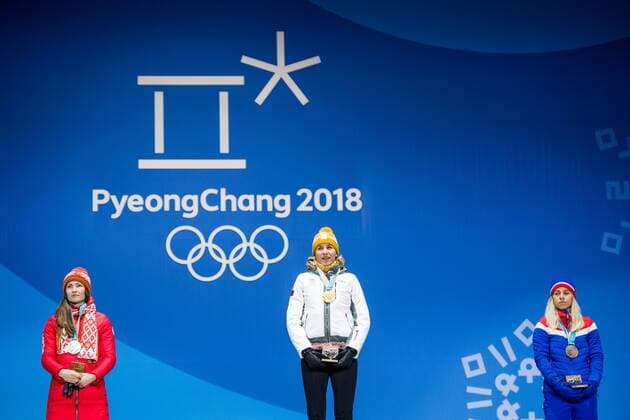 PyeongChang 2018 - Biathlon, 12,5km Massenstart Damen Siegerehrung 180218 Darya Domarcheva of Belarus, Silver, Anastasiya Kuzmina of Slovakia, Gold, Marte Olsbu of Norway , Bronze, celebrating at a Medal Ceremony for Women s 12.5km Mass Start during day nine of the 2018 Winter Olympics on February 18, 2018 in Pyeongchang. Photo: Petter Arvidson BILDBYRAN kod PA 91980 Copyright: PETTERxARVIDSON BB180218PA135
