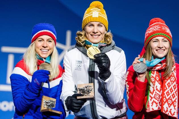PyeongChang 2018 - Biathlon, 12,5km Massenstart Damen Siegerehrung 180218 Marte Olsbu of Norway, Bronze, Anastasiya Kuzmina of Slovakia, Gold, Darya Domarcheva of Belarus, Silver, celebrating at a Medal Ceremony for Women s 12.5km Mass Start during day nine of the 2018 Winter Olympics on February 18, 2018 in Pyeongchang. Photo: Petter Arvidson BILDBYRN kod PA 91980 Copyright: PETTERxARVIDSON BB180218PA140