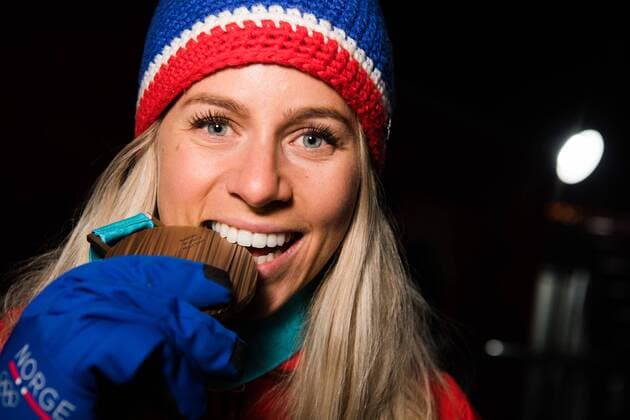 180218 Marte Olsbu of Norway , Bronze, celebrating with her Bronze medal at a Medal Ceremony for Women s 12.5km Mass Start during day nine of the 2018 Winter Olympics on February 18, 2018 in Pyeongchang. Photo: Petter Arvidson BILDBYRAN kod PA 91980 Copyright: PETTERxARVIDSON BB180218PA150