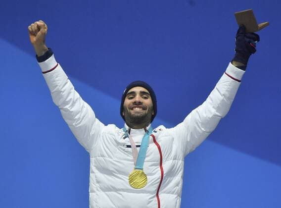 (180219) -- PYEONGCHANG, Feb. 19, 2018 -- Champion Martin Fourcade of France reacts during medal ceremony of men s 15km mass start event of biathlon at the 2018 PyeongChang Winter Olympic Games Olympische Spiele Olympia OS at Medal Plaza, PyeongChang, South Korea, Feb. 19, 2018. ) (SP)OLY-SOUTH KOREA-PYEONGCHANG-BIATHLON-MEN S 15KM MASS START-MEDAL CEREMONY LuixSiuxWai 