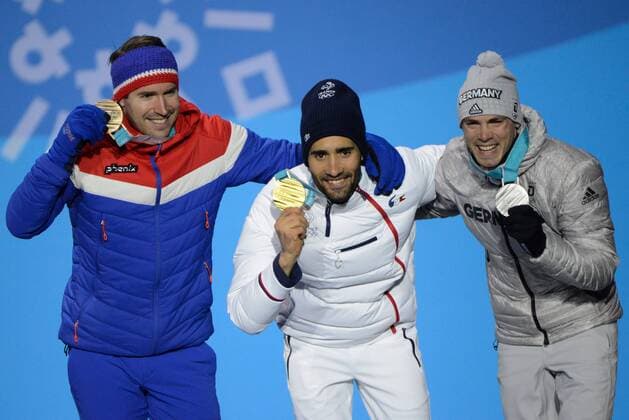February 19, 2018 - Pyeongchang, South Korea - SIMON SCHEMPP of Germany (right) , MARTIN FOURCADE of France (center) and EMIL HEGLE SVENDSEN of Norway with their medals from the Men s 15km Mass Start biathlon event in the PyeongChang Olympic Games Olympische Spiele Olympia OS Pyeongchang 18: Medal Winners - ZUMAl132 20180219_zap_l132_014 Copyright: xChristopherxLevyx