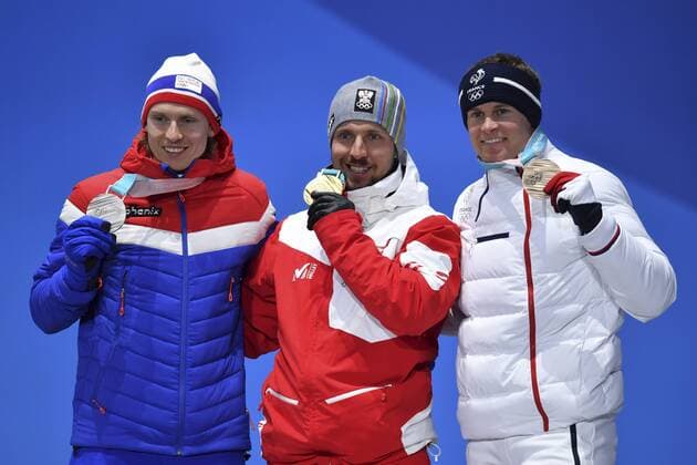 von links: Henrik KRISTOFFERSEN, NOR, 2. Platz, Silber, Silbermedaille, Silbermedaillengewinner, Marcel HIRSCHER, AUT, 1. Platz, Olympiasieger, Sieger, Gewinner, winner, Alexis PINTURAULT, FRA, 3. Platz, Bronze, Bronzemedaille, Bronzemedaillengewinner, Jubel, jubelt, Freude, Begeisterung, Emotion, jubeln, cheers, Alpine Skiing - Men s Giant Slalom, Ski Alpin, Riesenslalom der Herren. Siegerehrung, Victory Ceremony, PyeongChang Olympic Medals Plaza am 18.02.2018. Olympische Winterspiele 2018, vom 09.02. - 25.02.2018 in PyeongChang Suedkorea. Â