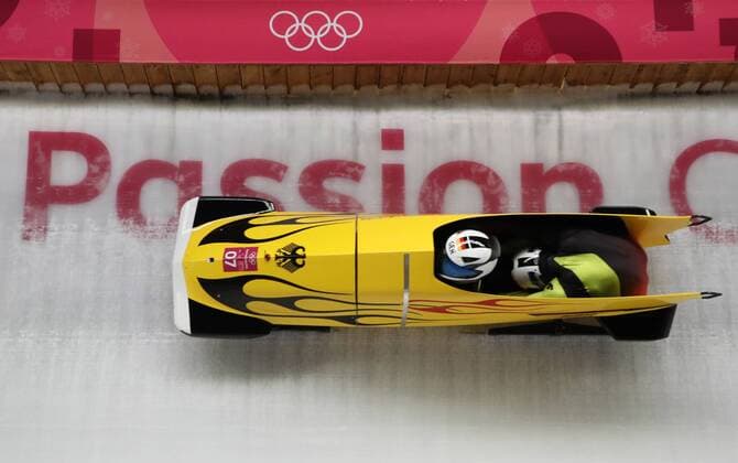(180219) -- PYEONGCHANG, Feb. 19, 2018 -- Germany s Francesco Friedrich and Thorsten Margis compete during 2-man event of bobsleigh at the 2018 PyeongChang Winter Olympic Games Olympische Spiele Olympia OS at Olympic Sliding Centre, PyeongChang, South Korea, Feb. 19, 2018. Francesco Friedrich and Thorsten Margis claimed champion, together with Canada s Justin Kripps and Alexander Kopacz, in a time of 3:16.86. ) (SP)OLY-SOUTH KOREA-PYEONGCHANG-BOBSLEIGH-2-MAN BaixXuefei 