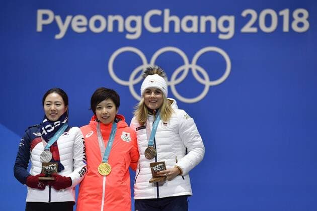 L-R South Korean speed skater Lee Sang-hwa (silver), Japanese Nao Kodaira (gold) and Czech Karolina Erbanova (bronze) stand on the podium during the medal ceremony of the Women s 500 m Speed skating Eisschnelllauf within the 2018 Winter Olympics in Gangneung, South Korea, February 20, 2018. (CTKxPhoto MichalxKamaryt) CTKPhotoP201802200555901  kmt 7