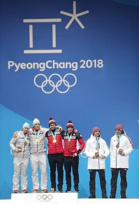 (180220) -- PYEONGCHANG, Feb. 20, 2018 -- Gold medalists Germany s Francesco Friedrich and Thorsten Margis, Canada s Justin Kripps and Alexander Kopacz (L to R), bronze medalists Latvia s Oskars Melbardis and Janis Strenga pose for photos during medal ceremony of 2-man event of bobsleigh at the 2018 PyeongChang Winter Olympic Games Olympische Spiele Olympia OS at Medal Plaza, PyeongChang, South Korea, Feb. 20, 2018. ) (SP)OLY-SOUTH KOREA-PYEONGCHANG-BOBSLEIGH-2-MAN-MEDAL CEREMONY WuxZhuang 