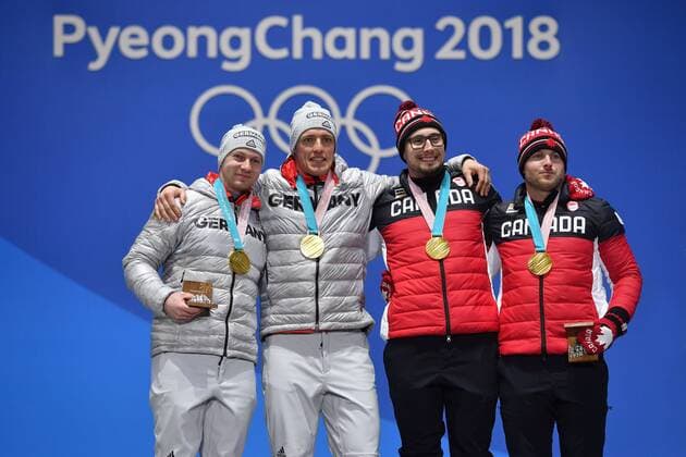 v.li:Francesco FRIEDRICH Thorsten MARGIS (GER),Justin KRIPS Alexander KOPACS (CAN),, Zweier Bob,Men s Two Man Bob,Doppelgold, Siegerehrung,Victory Ceremony,PyeongChang Olympic Medals Plaza am 20.02.2018. Olympische Winterspiele 2018, vom 09.02. - 25.02.2018 in PyeongChang Suedkorea.