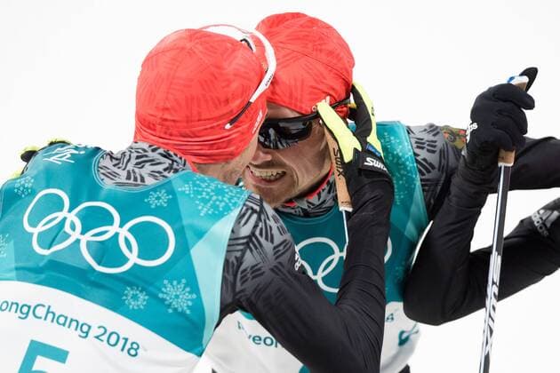 Olympia-Bilder des Tages - SPORT 180220 Eric Frenzel, Johannes Rydzek and Fabian Riessle of Germany, Gold, celebrates after the Nordic Combined Individual Gundersen LH 10km during day eleven of the 2018 Winter Olympics on February 20, 2018 in Pyeongchang. Photo: Jon Olav Nesvold BILDBYRAN kod JE 160187 Copyright: JONxOLAVxNESVOLD BB180220JE105
