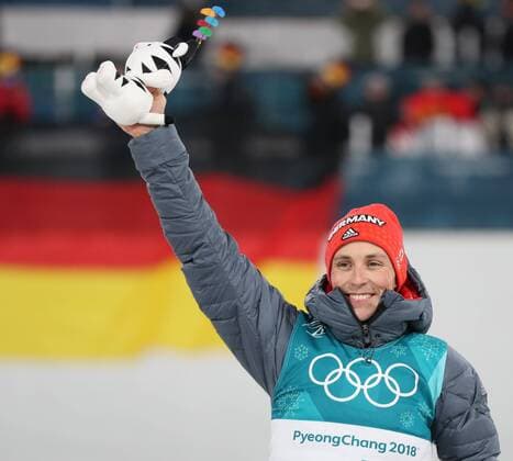 (180220) -- PYEONGCHANG, Feb. 20, 2018 -- Third-placed Eric Frenzel from Germany celebrates during venue ceremony of individual gundersen LH 10KM of nordic combined at the 2018 PyeongChang Winter Olympic Games Olympische Spiele Olympia OS at Alpensia Cross-Country centre, PyeongChang, South Korea, Feb. 20, 2018. ) (SP)OLY-SOUTH KOREA-PYEONGCHANG-NORDIC COMBINED-INDIVIDUAL GUNDERSEN LH 10KM BaixXuefei 