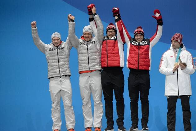February 20, 2018 - Pyeongchang, South Korea - The German and Canadian 2- man bobsleigh teams celebrate winning the gold medal in the 2-man bobsleigh event in the PyeongChang Olympic Games Olympische Spiele Olympia OS .German team members are Francesco FRANCESCO and THORSTEN MARGIS..Canadians - JUSTIN KRIPPS and ALEXANDER KOPACZ Pyeongchang 18: Medal Winners - ZUMAl132 20180220_zap_l132_044 Copyright: xChristopherxLevyx