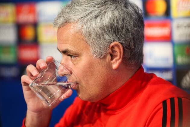 20th February 2018, Ramon Sanchez Pizjuan, Seville, Spain; UEFA Champions League football, Sevilla versus Manchester United ManU pre match training and press conference PK Pressekonferenz Jose Mourinho, Manchester United Coach drinks water during the Press Conference  ActionPlus11990573