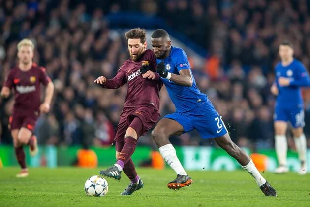 Lionel Messi of Barcelona and Antonio Rudiger of Chelsea challenge for the ball during the UEFA Champions League Round of 16 match between Chelsea and Barcelona at Stamford Bridge, London, England on 20 February 2018. Copyright: xSalvioxCalabresex 19030123