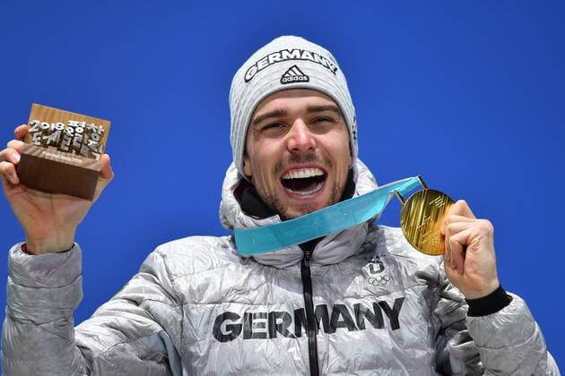 PyeongChang 2018 - Nordische Kombination, Siegerehrung Johannes RYDZEK (GER) mit Goldmedaille, Medaille,Olympiasieger,Olympic Champion, Nordic Combined - Ind. Gund. LH 10km, Cross-Country Siegerehrung,Nordische Kombination. Victory Ceremony,PyeongChang Olympic Medals Plaza am 21.02.2018. Olympische Winterspiele 2018, vom 09.02. - 25.02.2018 in PyeongChang Suedkorea.