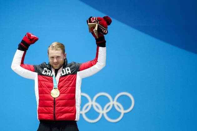 OLYMPICS - 2018 Winter Olympics PYEONGCHANG,SOUTH KOREA,21.FEB.18 - OLYMPICS,FREESTYLE SKIING - Olympic Winter games Winterspiele Spiele Summer games PyeongChang 2018, Medals Plaza, downhill, Ski Cross, men, award ceremony. Image shows Brady Leman (CAN). Keywords: medal. GEPAxpictures xMaticxKlansek