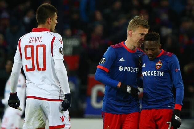 MOSCOW, RUSSIA - FEBRUARY 21, 2018: Crvena Zvezda Belgradeâ€™s Vujadin Savic, CSKA Moscow s Pontus Wernbloom and Ahmed Musa (L-R) in their 2017-2018 UEFA Europa League Round of 32 second leg football match at VEB Arena in Moscow. Mikhail Tereshchenko TASS  TS075230
