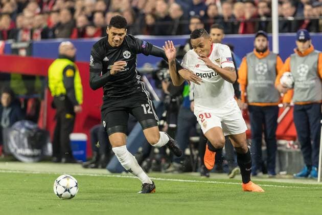 Spain, Sevilla 21.02.2018, UEFA Champions League - 2017 18 Season, Round of 16, First leg, Sevilla FC - Manchester United ManU FC, Chris Smalling (MAN) und Luis Muriel (FCS) im Zweikampf ( DeFodi507